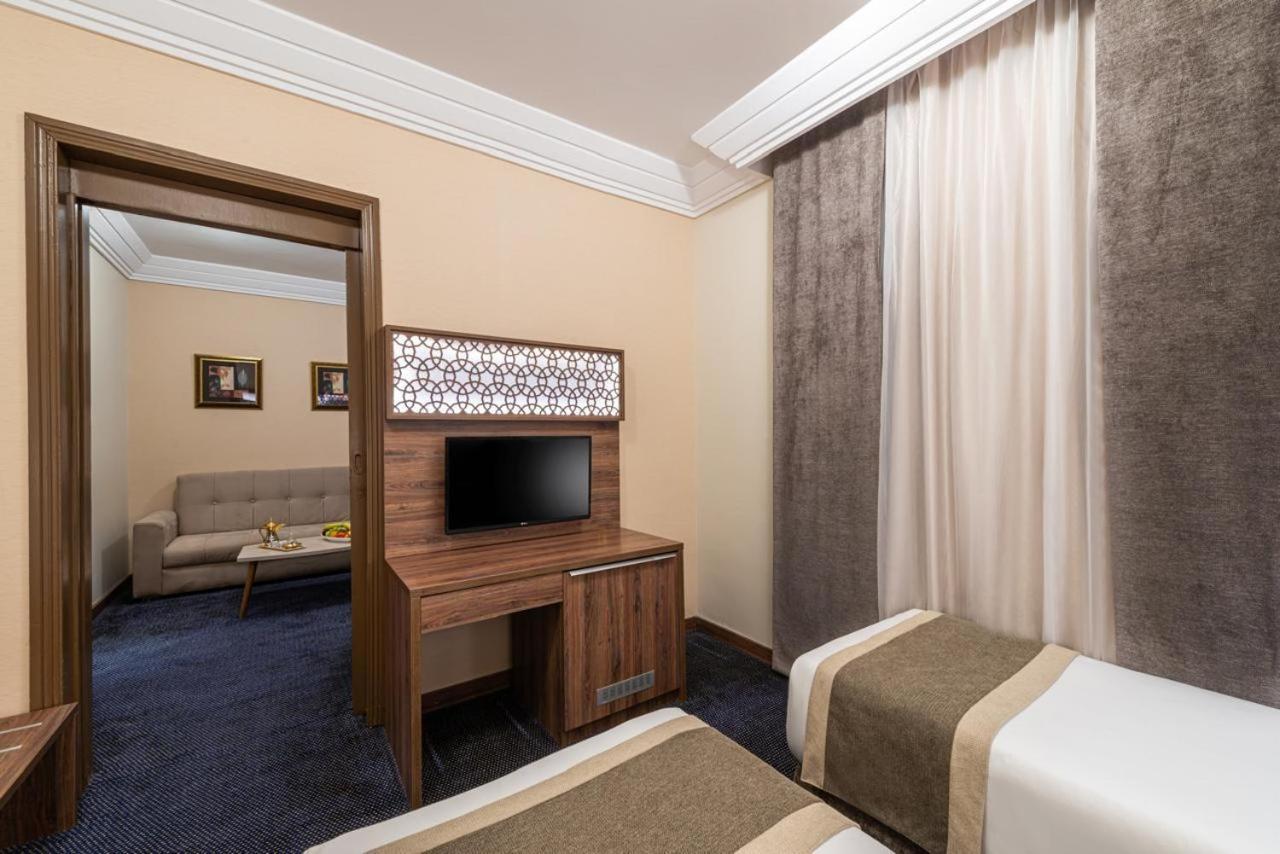 Golden Tulip Al-Zahabi Hotel Medina Phòng bức ảnh