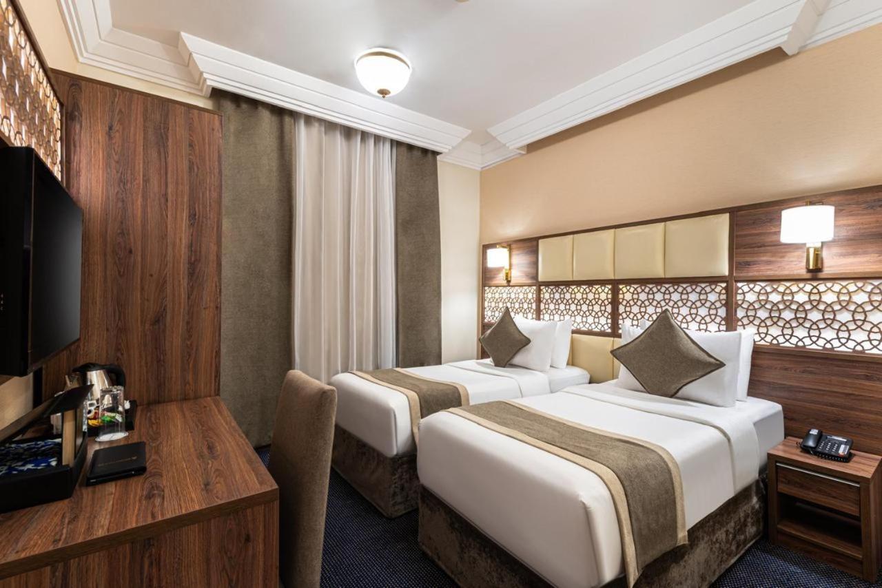 Golden Tulip Al-Zahabi Hotel Medina Phòng bức ảnh
